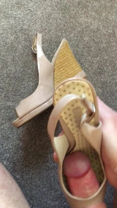 Cumming into Patent peep toe wedges
