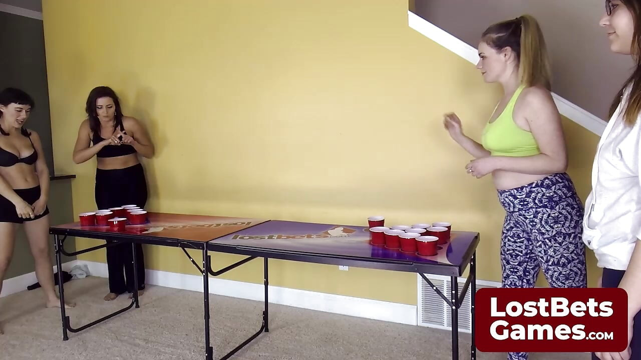 The Strip Air Pong losers eagerly please the winners