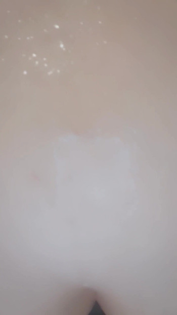 Emotional moment from "Having fun in the shower even stick my big black dildo to the wall and take it all in"