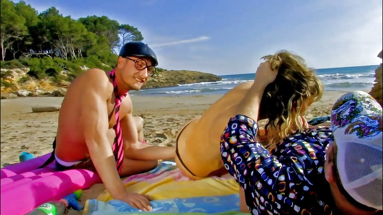 MILF gags on two huge cocks on the beach then gets fucked to mouth cumshot