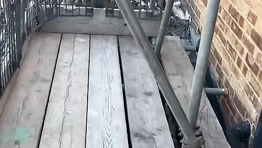 peeping scaffolders looking in the window