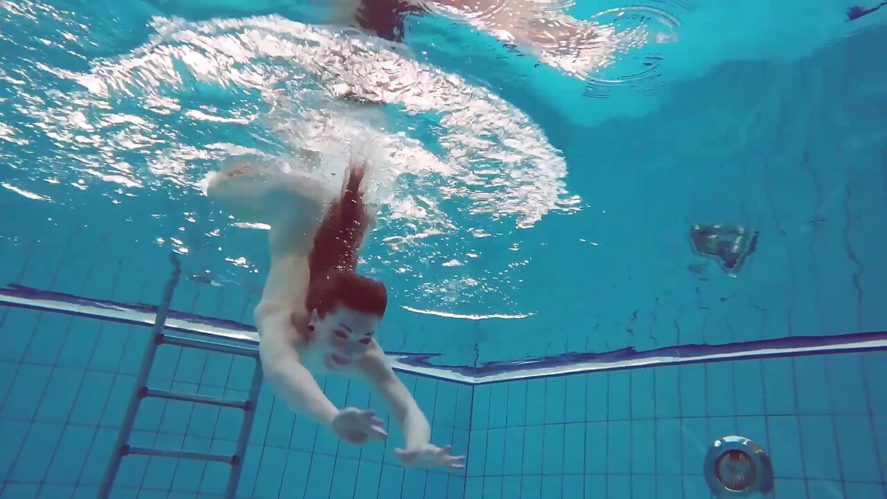 Pretty Polish teen Alice swimming without clothes on