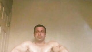 Face Reveal. Oiled Up Muscle Pose down