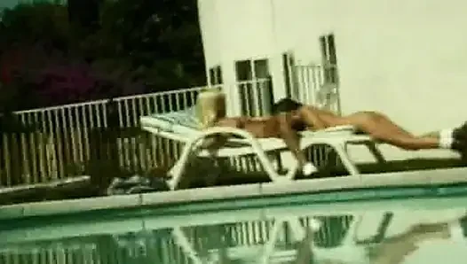 Tempting babes sharing big dildo poolside