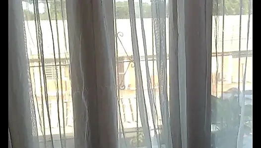 My stepmother trimming her hair and showing off to the street, filmed and sent me and asked if it was good.