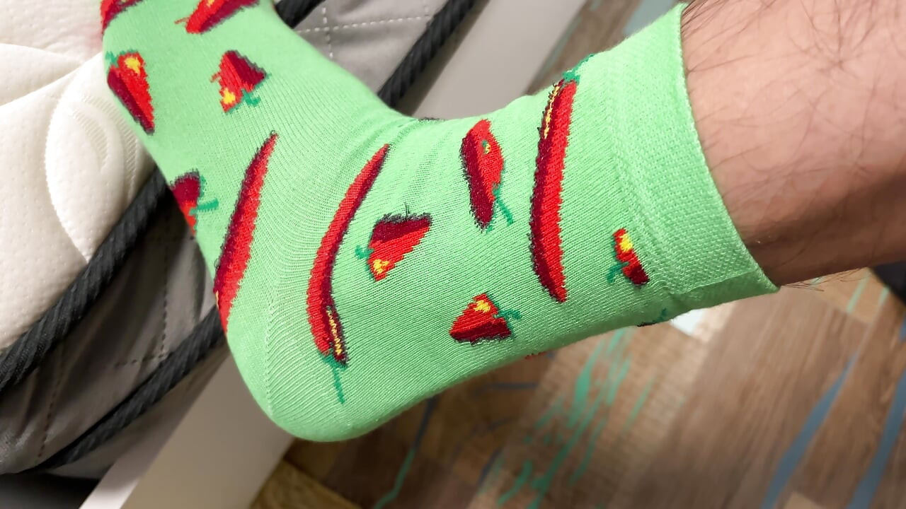 Playful Green Socks with Red Pepper Pattern pres. by Earl Smile