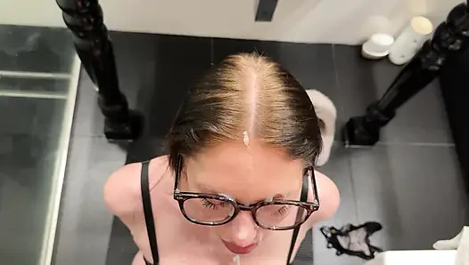 Girl in glasses takes cum in the shower