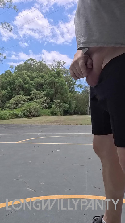 Straight guy hanging out his uncut cock at the public space.