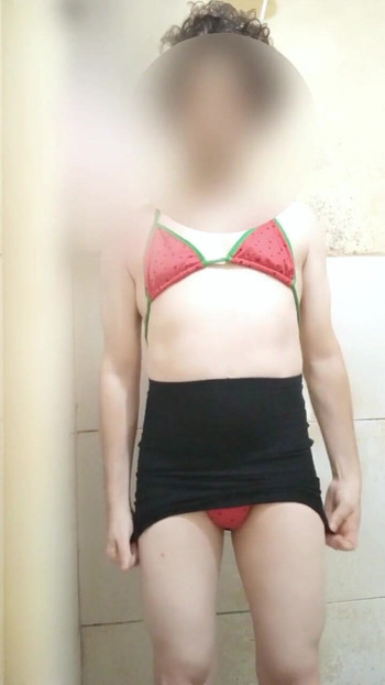 Key moment from "Wearing a Brazilian miniskirt and bikini"