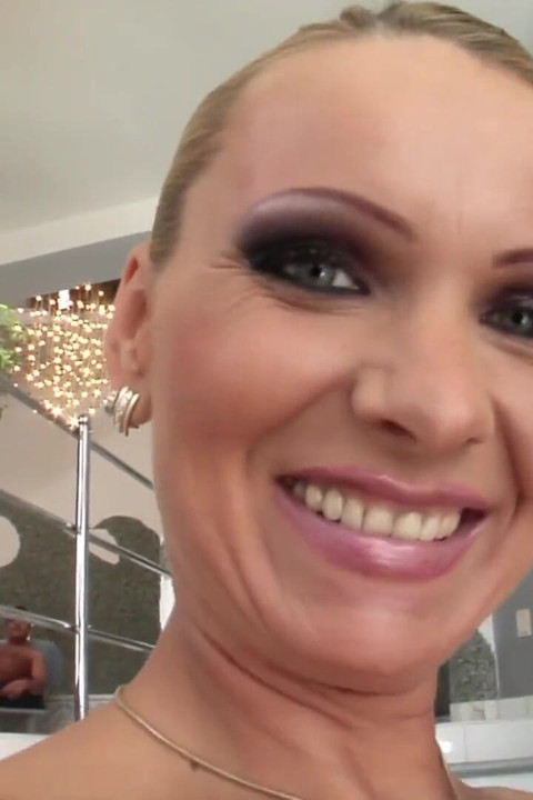 Hot milf gets a double penetration after sucking two huge cocks