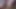 Amateur woman dances and tries on clothes that she cuts. Amateur woman vacuums the bedroom.