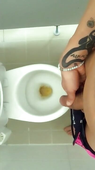 Tattooed Twink Is Pissing in Waterpark Piss Filled Toilet
