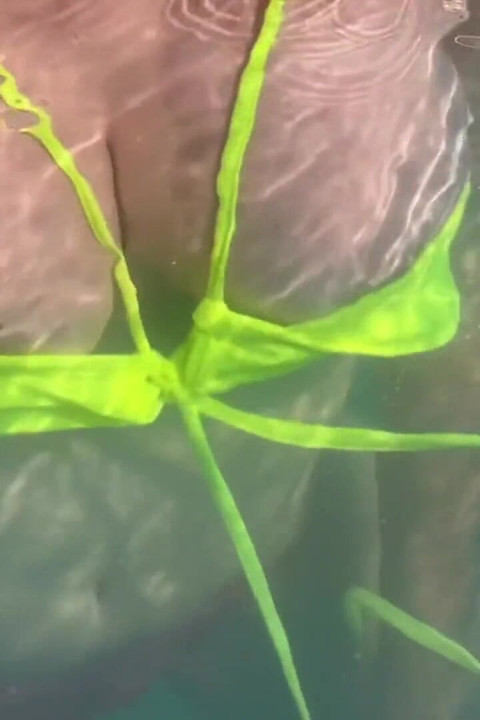 Artemisia Love Swimming in the Pool Flashing Her Big Juicy Boobs and Smoking a Cigarette