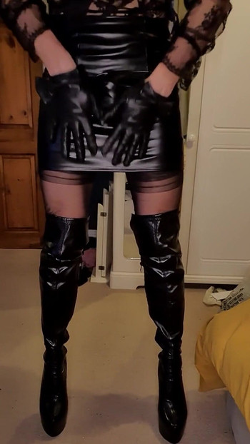 Dressed up in a tight leather mini skirt and slipping into my thigh high leather boots  Let me know if you have a boot fetish