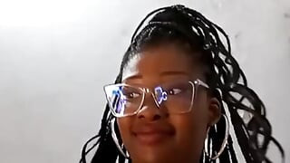 Sucking and shaking her own giant tits