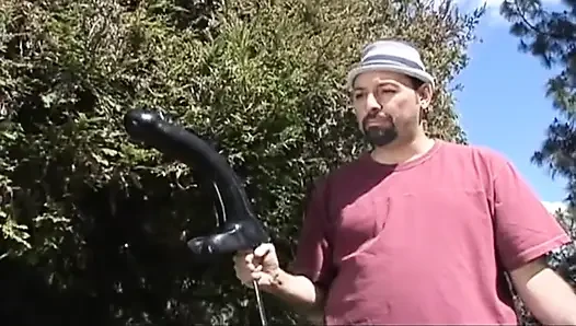 A big hard black dildo for a slut outdoor