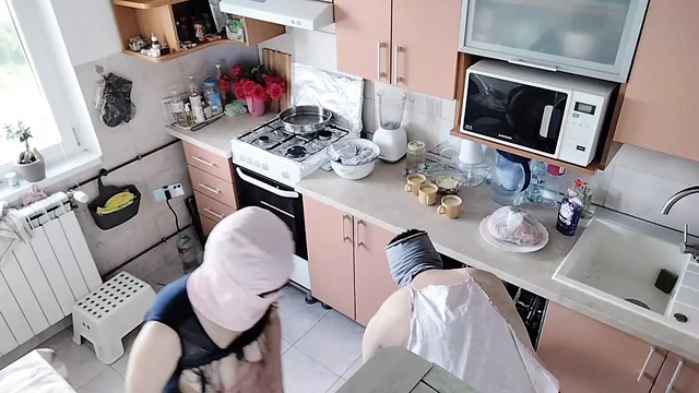 Hot amateur couple having fun in the kitchen.