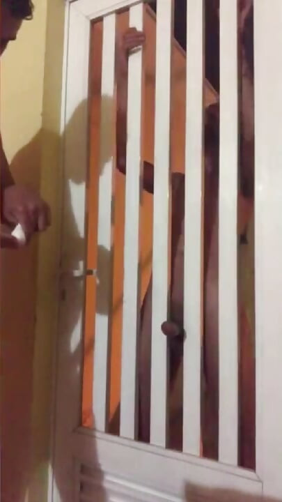 Giving it to my neighbor at the gate of his house