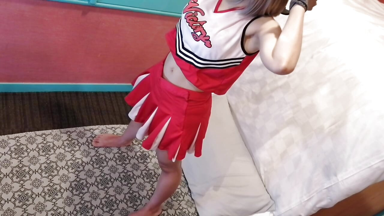A cute, busty married woman performs exercise 4 in an erotic cheerleader costume. Peeking down from above. Home made amateur Private Shoot