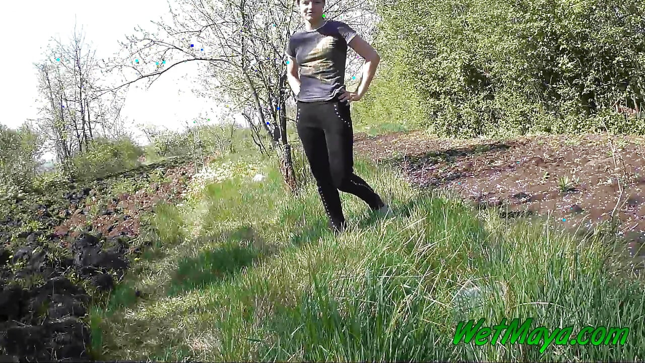 Pissing in grass on the side of the road
