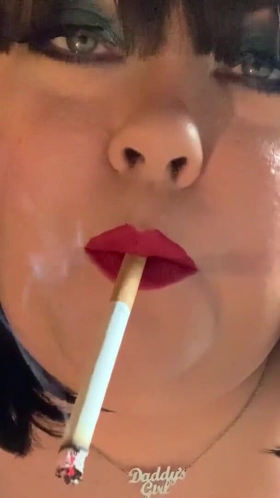 Captivating moment from "BBW Tina Snua Chain Smoking Cigarettes With Nose Exhales"