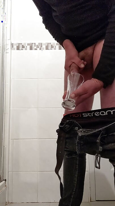 He jerks off and spits his into a glass
