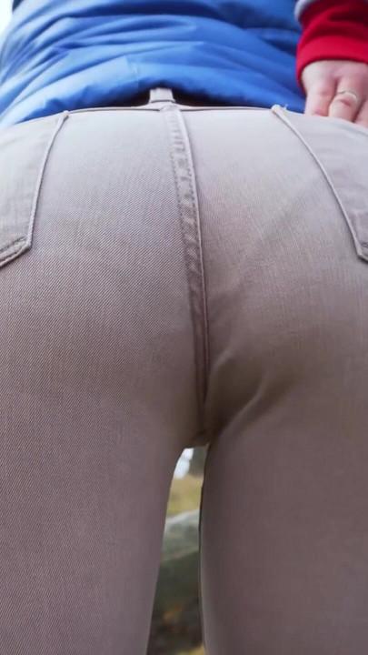 Stunning moment from "Real Amateur In Tight Pants Showing Off Her Visible Panty Line Ass Outdoor"