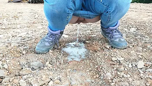 Wife pissing outdoors for all to see!