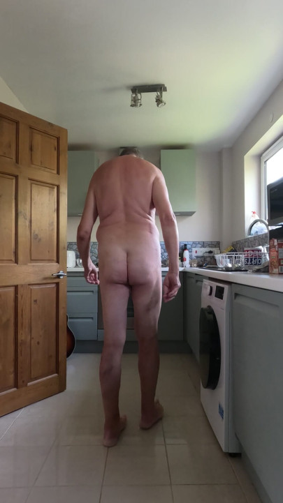Stripping naked in the kitchen