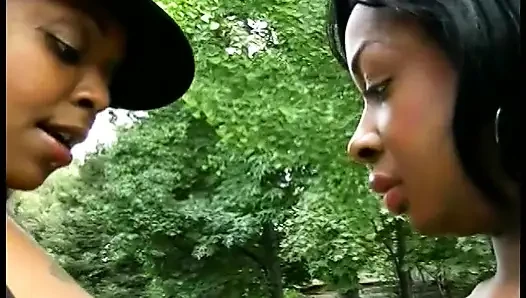 Thick black slut lifts legs to get her wet pussy licked by a chick