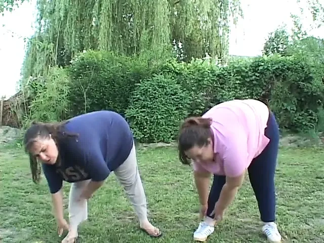 Large ladies finger each other's pussies