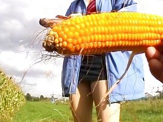 Stunning German lady stuffing a corn in her moist holes