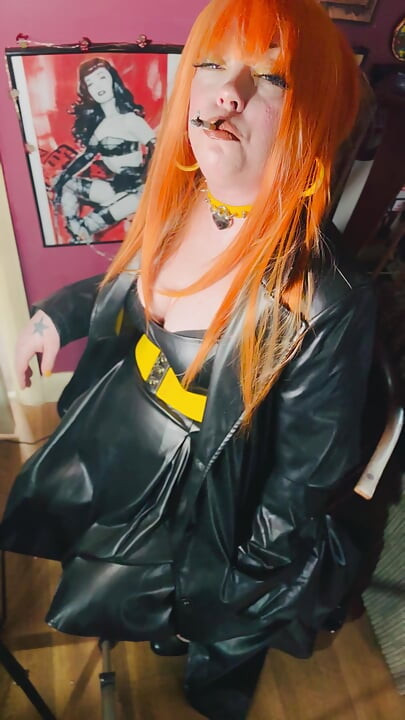 The Gothic Cutie Tina Snua Dressed In a Leather Coat & Smoking A Cork 100 Cigarette - Ginger Miss Smokes In A Leather Outfit OME
