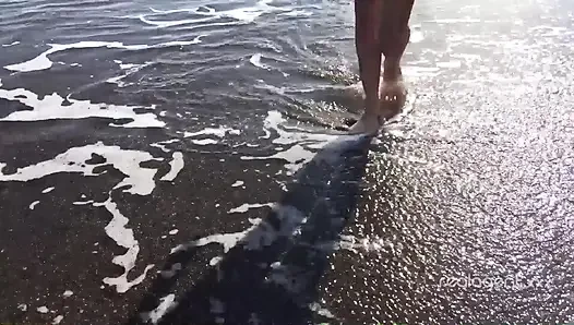 Alone lush Russian babe toys her cunt on the rock on the sea shore