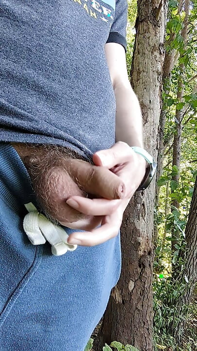 Rubbing myself through my shorts pocket while hiking until I have to stop and cum on the trail