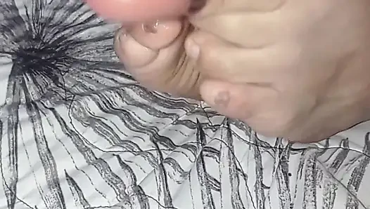 Masturbating