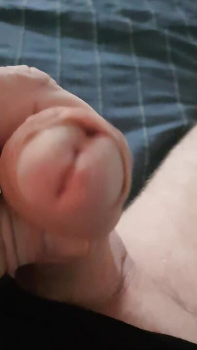 I lay and caress my cock and jerk off it longs