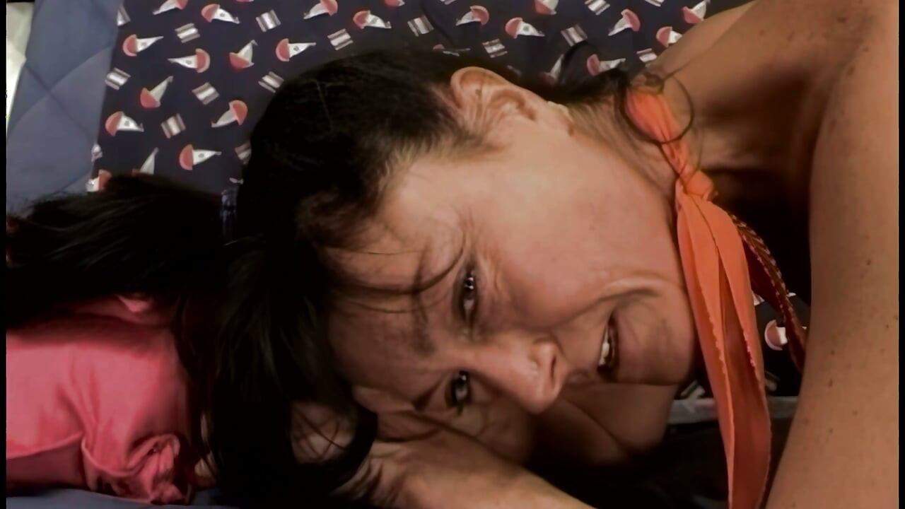 The Young Girl Stretches Out the MILF's Pussy with Her Hand