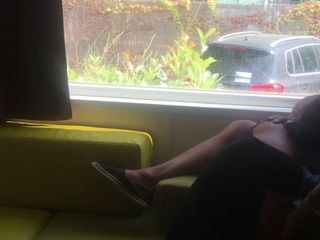 Wife giving risky blowjob in front of window in a camper van