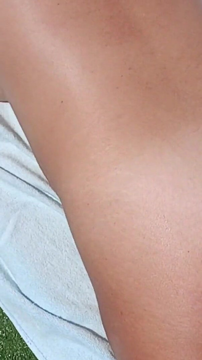 Epic moment from "Sexy french milf sunbathes naked and rubs sunscreen in her tanned vody"
