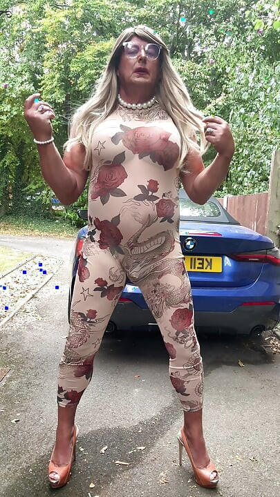 Sexy Crossdresser kellycd2022 in sexy floral see thru catsuit and heels