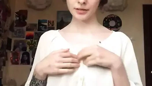 She took off her underwear on camera and showed a smooth pussy.