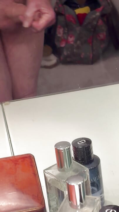 Masturbating