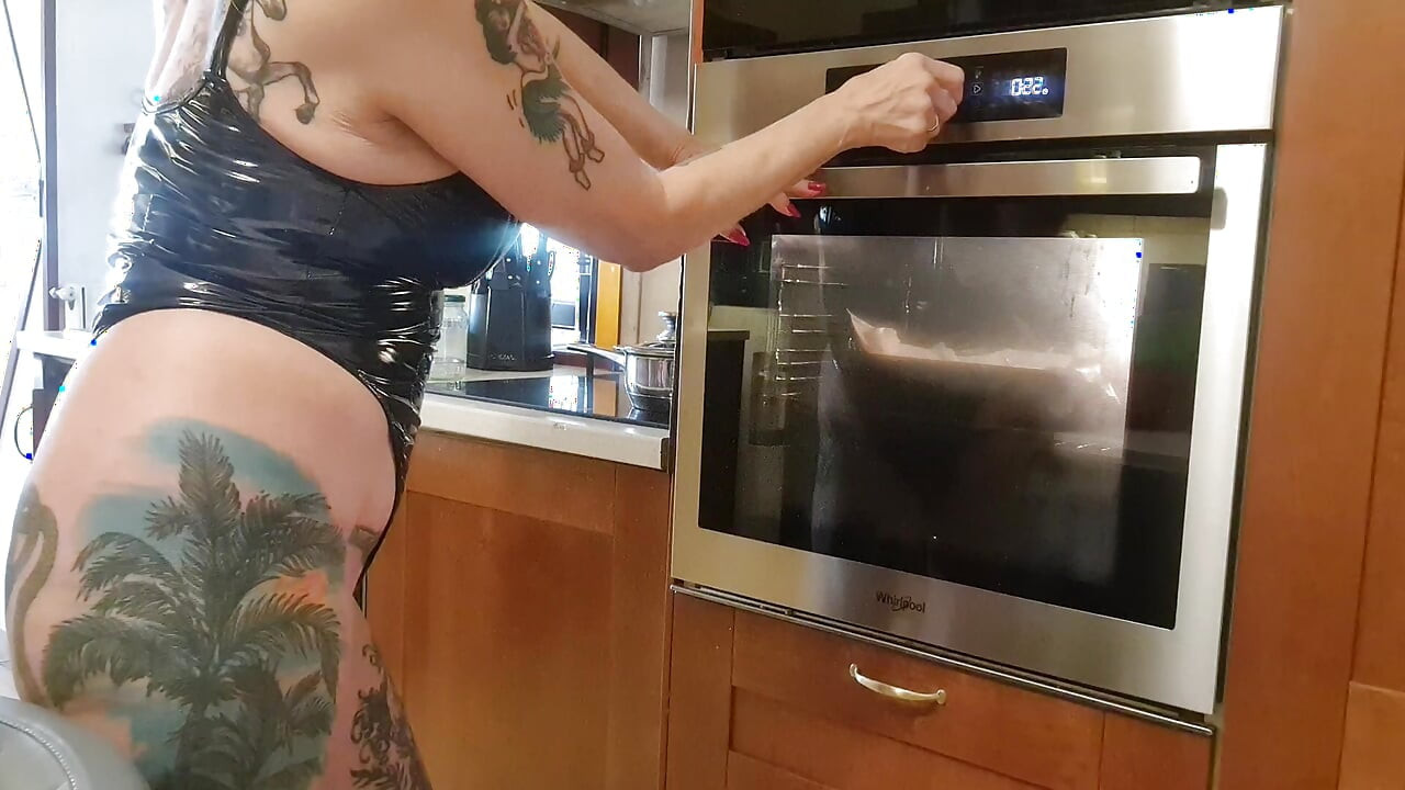 Melissa Johnson in latex, baking