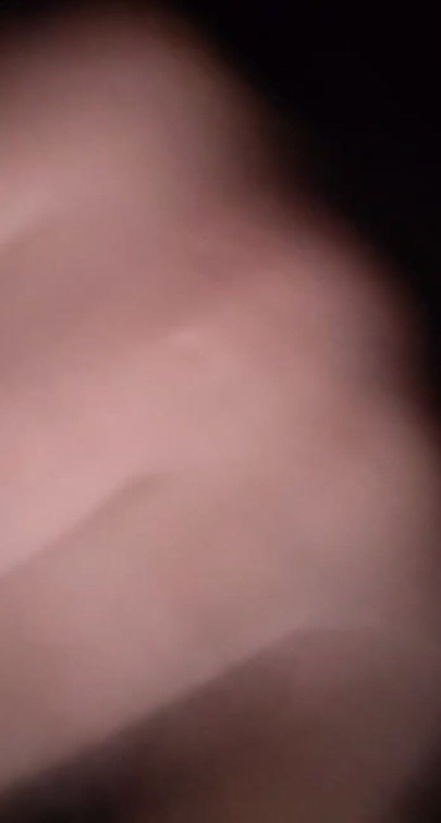Masturbating
