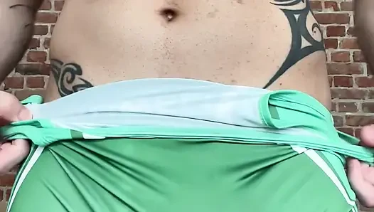 Jock rubs his cock in wrestling singlet and cums hands free