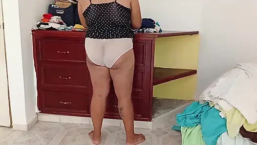 Chubby Girl Tidying the Room and Folding Clothes