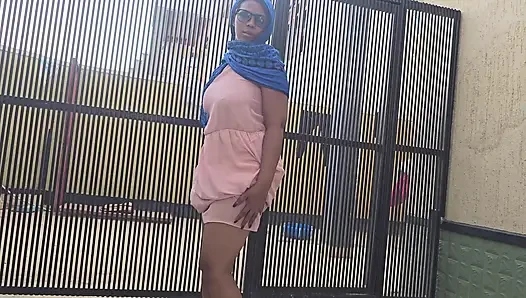 THE  ARABIAN GIRL TRYING TO SQUIRT OUTISIDE NEAR THE ROAD