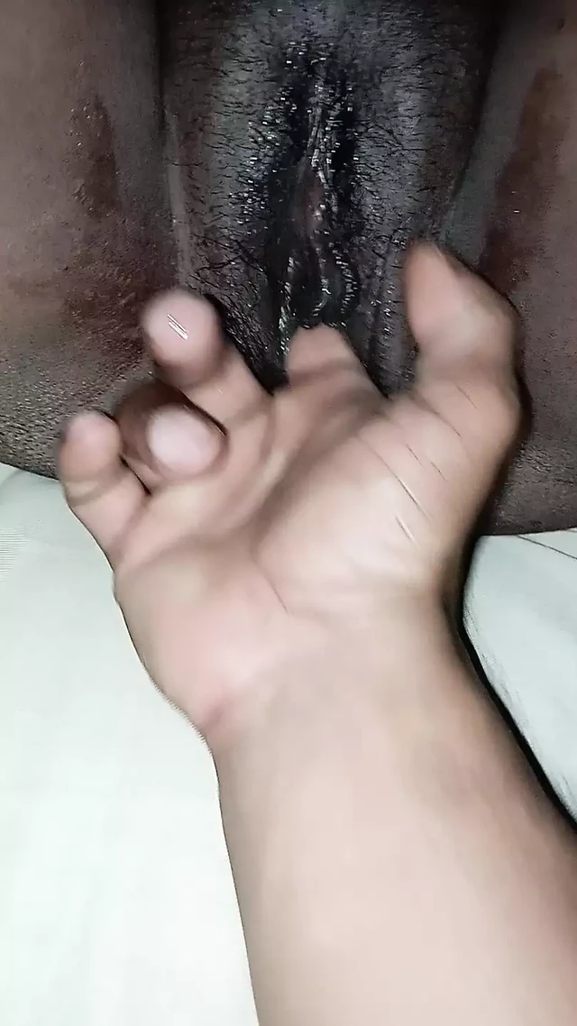 Massage the wife's pussy with fingers and make her cum