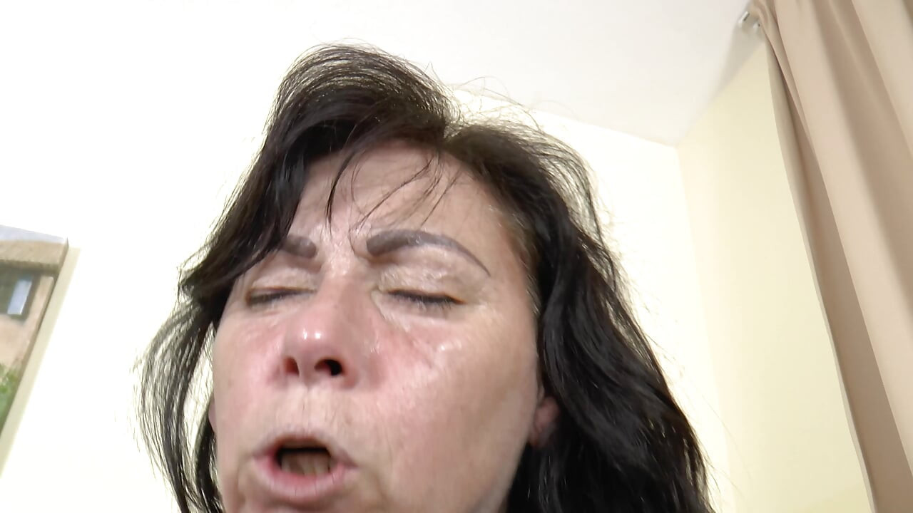 Milf sucks a huge cock then rides it deep on the sofa